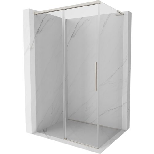 Przesuwana kabina prysznicowa o wymiarach 120 x 85 cm z transparentnym szkłem i niklowanymi elementami, umieszczona w marmurowej wnęce. Produkt ma prostokątny kształt i wyposażony jest w pionowy uchwyt na drzwiach.