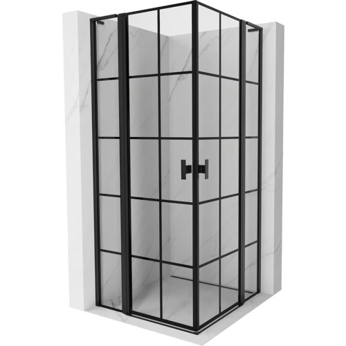 Na zdjęciu znajduje się kabina prysznicowa z czarną kratką i uchylnymi drzwiami, umieszczona w narożniku z marmurowymi ścianami. Kabina ma nowoczesny design z wyraźnymi, czarnymi liniami i prostokątnym uchwytem.