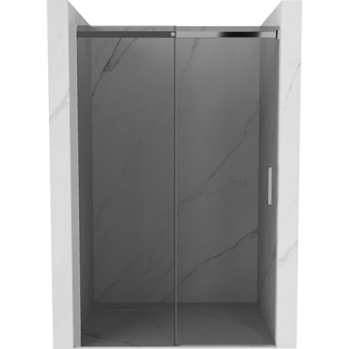 Na zdjęciu widoczne są rozsuwane drzwi prysznicowe w kolorze grafitowym z chromowanymi elementami, zamontowane w marmurowej wnęce. Drzwi mają prosty, nowoczesny design z pionowym uchwytem po prawej stronie.