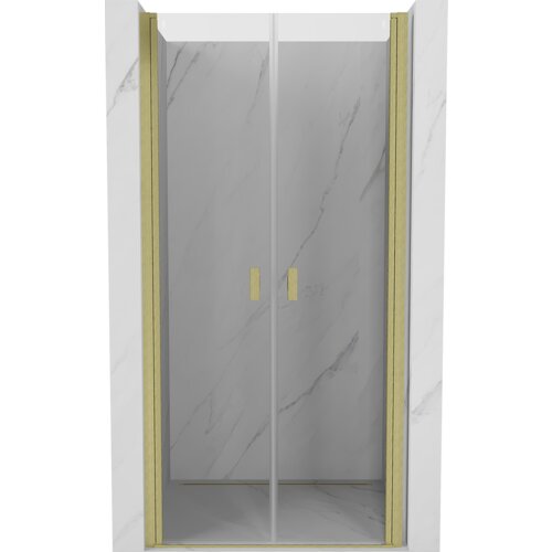 Drzwi prysznicowe uchylne o szerokości 80 cm, wykonane z transparentnego szkła, z ramą i uchwytami w kolorze złotym szczotkowanym. W tle widoczna jest ściana z marmurowym wzorem.
