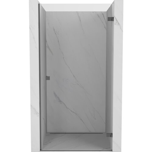 Na zdjęciu widoczne są drzwi prysznicowe z przezroczystego szkła, zamontowane w marmurowej wnęce z metalowymi zawiasami. Drzwi mają minimalistyczny design i wykończenie w kolorze gun metal.