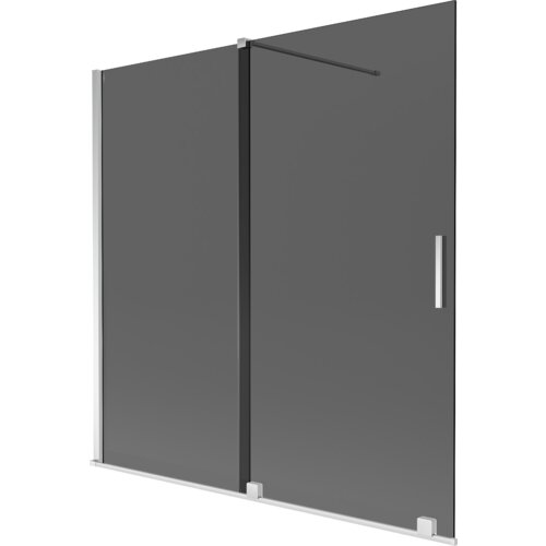Dwuskrzydłowy, rozsuwany parawan nawannowy w kolorze grafitowym z chromowanymi elementami, posiada prostokątny uchwyt na jednym ze skrzydeł. Produkt ma minimalistyczny design i jest wykonany z przezroczystego materiału.