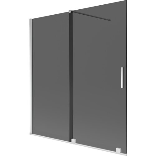 Dwuskrzydłowy, rozsuwany parawan nawannowy w kolorze grafitowym z chromowanymi elementami, posiada prostokątną, metalową rączkę. Produkt ma minimalistyczny design i jest wykonany z przezroczystego materiału.