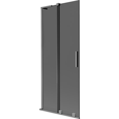 Dwuskrzydłowy, rozsuwany parawan nawannowy w kolorze grafitowym z metalicznym wykończeniem, posiada prostokątną, pionową rączkę. Produkt ma minimalistyczny design i jest wykonany z przezroczystego materiału z ciemnym obramowaniem.