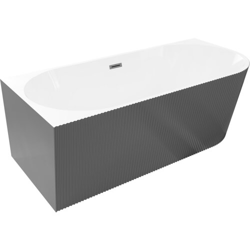 Biała wanna wolnostojąca o ryflowanej, szarej powierzchni zewnętrznej, z widocznym przelewem w kolorze gun metal. Produkt ma kształt prostokątny z zaokrąglonymi narożnikami.