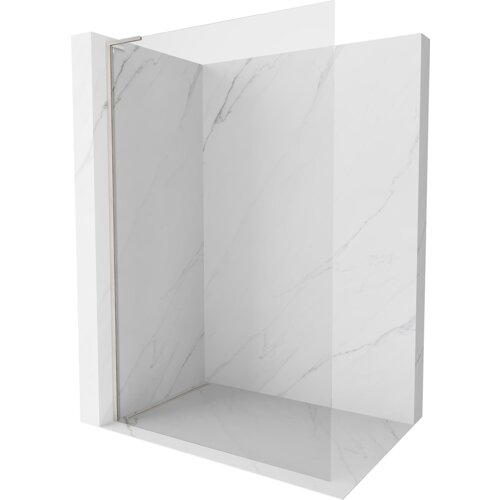 Przeszklona ścianka prysznicowa typu walk-in o wymiarach 120 x 200 cm, wykonana z transparentnego szkła o grubości 10 mm, z elementami w kolorze niklu szczotkowanego. Ścianka jest zamontowana w narożniku wyłożonym płytkami imitującymi biały marmur z delikatnym szarym użyleniem.