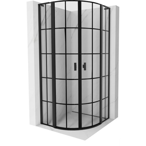 Półokrągła kabina prysznicowa z czarną kratką, wykonana ze szkła i metalu, umieszczona w narożniku wyłożonym jasnymi płytkami o marmurowym wzorze. Drzwi kabiny posiadają dwa uchwyty w kolorze czarnym.