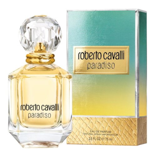Flakon perfum o nazwie "roberto cavalli paradiso" z przezroczystym, kryształowym korkiem stoi obok pudełka w gradientowych kolorach zieleni i żółci. Na pudełku widnieje napis: "roberto cavalli paradiso", a poniżej: "EAU DE PARFUM NATURAL SPRAY VAPORISATEUR 2.5 FL OZ e 75 ml".