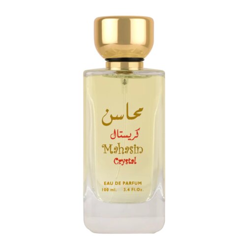 Butelka perfum o pojemności 100 ml z napisem "Mahasin Crystal" oraz "Eau de Parfum 100 ml 3.4 Fl. Oz." na przezroczystym tle, z złotym korkiem.
