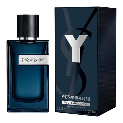 Na zdjęciu widoczna jest ciemnoniebieska butelka perfum z napisem "Yves Saint Laurent" oraz pasujący do niej kartonik z dużą literą "Y". Na kartoniku znajduje się również napis "EAU DE PARFUM INTENSE VAPORISATEUR - SPRAY 3.3 fl. oz. e 100 ml".