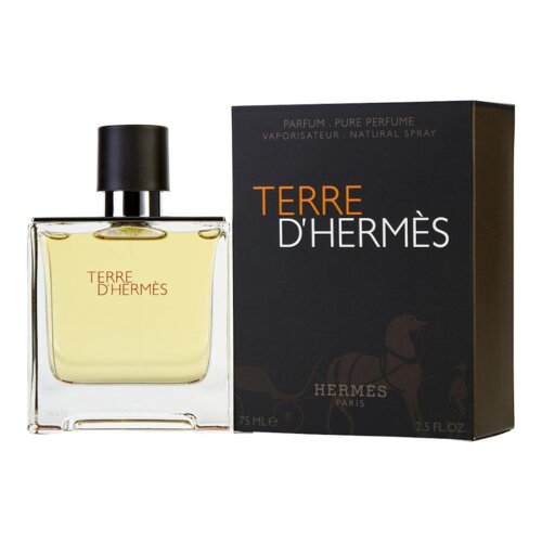 Na zdjęciu widoczna jest butelka perfum z napisem "TERRE D'HERMÈS" oraz pudełko z tym samym napisem. Na pudełku znajdują się dodatkowe napisy: "PARFUM. PURE PERFUME VAPORISATEUR. NATURAL SPRAY" oraz "HERMÈS PARIS 75 ML ℮ 2.5 FL.OZ".