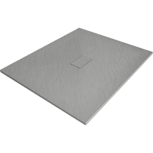 Szary, prostokątny brodzik o teksturowanej powierzchni z centralnie umieszczonym odpływem w kształcie prostokąta. Produkt ma wymiary 130 x 100 cm.