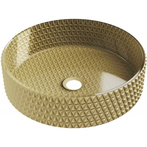 Złota, okrągła umywalka nablatowa o wymiarach 39 x 39 cm z fakturą w kształcie małych piramidek na zewnętrznej powierzchni. W centrum umywalki znajduje się otwór odpływowy.