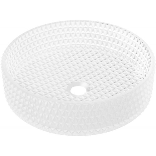 Przedstawiona jest okrągła, matowa umywalka nablatowa o wymiarach 39 x 39 cm, wykonana ze szkła, z widocznym wzorem w formie wypukłych, geometrycznych kształtów na zewnętrznej powierzchni. Na dnie umywalki znajduje się otwór odpływowy.