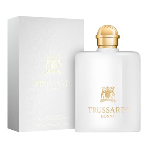 Biały flakon perfum z złotym korkiem, obok białego pudełka z napisem "TRUSSARDI DONNA" oraz herbem. Na pudełku widnieje tekst: "EAU DE PARFUM NATURAL SPRAY VAPORISATEUR 100 ml 3.4 fl.oz US".