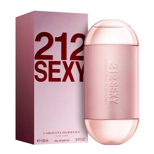 Na zdjęciu widoczna jest różowa butelka perfum z napisem "212 SEXY CAROLINA HERRERA" oraz pudełko z dużym napisem "212 SEXY". Na pudełku znajdują się również informacje: "e100ml", "eau de parfum", "3.4 FL OZ".