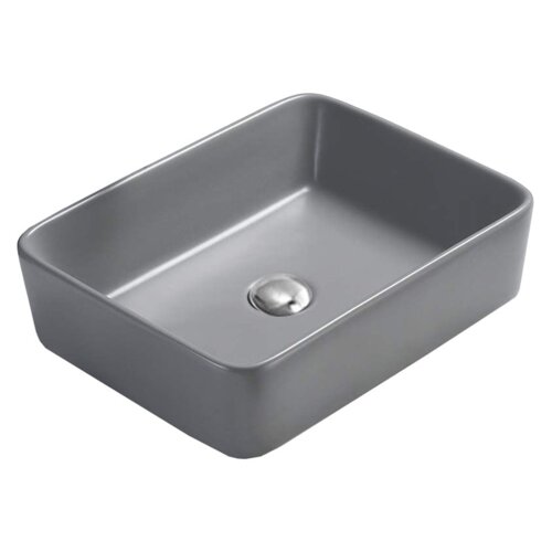 Szara, matowa umywalka nablatowa o prostokątnym kształcie z zaokrąglonymi krawędziami, z widocznym metalowym odpływem na dnie. Produkt ma gładką powierzchnię i minimalistyczny design.