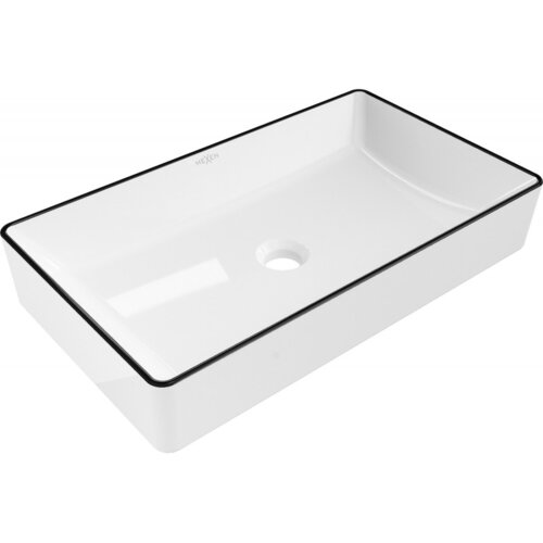 Prostokątna umywalka nablatowa w kolorze białym z czarnym obramowaniem, z centralnie umieszczonym otworem odpływowym. Na wewnętrznej stronie widoczne jest logo "MEXEN".