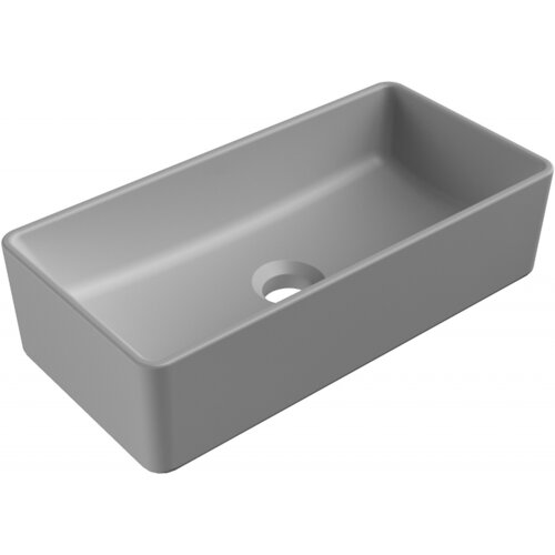 Na zdjęciu znajduje się prostokątna, szara umywalka nablatowa o matowym wykończeniu, z otworem na odpływ umieszczonym centralnie. Umywalka ma gładkie, zaokrąglone krawędzie.