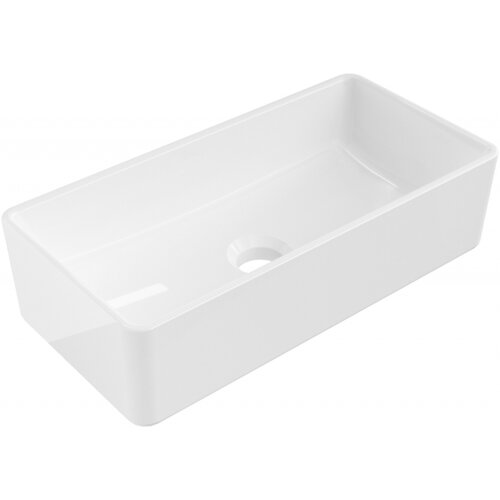 Biała, prostokątna umywalka nablatowa z gładkimi krawędziami i otworem odpływowym na dnie. Produkt ma minimalistyczny design i błyszczącą powierzchnię.