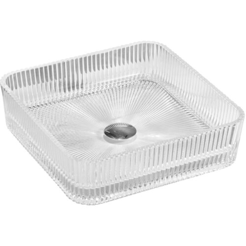 Przezroczysta, kwadratowa umywalka nablatowa o wymiarach 39 x 39 cm z wyraźnym, promienistym wzorem na dnie i pionowymi żłobieniami na bokach. W centrum umywalki znajduje się okrągły otwór odpływowy.