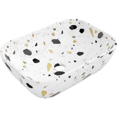 Biała umywalka nablatowa z kamienia terrazo o wymiarach 45 x 32 cm, ozdobiona kolorowymi plamkami w odcieniach czerni, zieleni i złota. Na powierzchni widoczne jest logo "MEXEN".