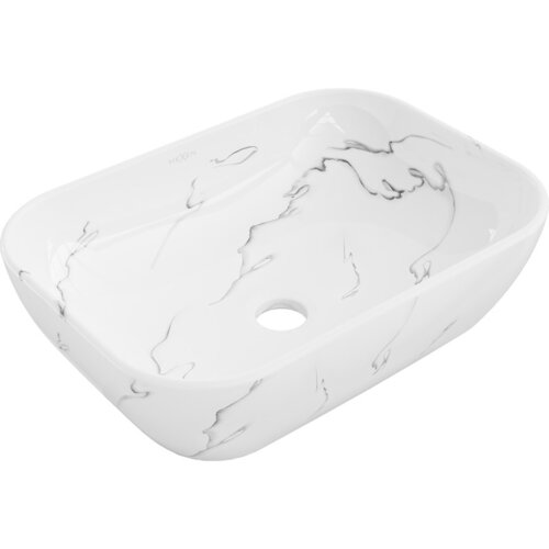 Biała umywalka nablatowa o prostokątnym kształcie z zaokrąglonymi rogami, ozdobiona delikatnym, szarym wzorem przypominającym marmur. Na wewnętrznej krawędzi widoczne jest logo "MEXEN".