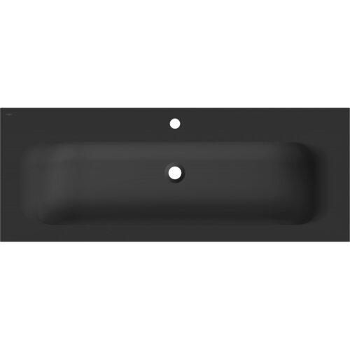 Czarna matowa umywalka wpuszczana w blat o prostokątnym kształcie z dwoma otworami, jednym na baterię i jednym odpływowym. W lewym górnym rogu widoczny jest napis "Mexen".