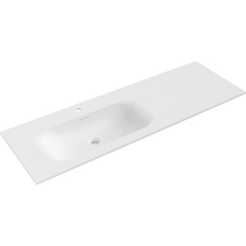 Biała matowa umywalka wpuszczana w blat o prostokątnym kształcie z otworem na baterię i odpływem. Produkt ma gładką powierzchnię i minimalistyczny design.