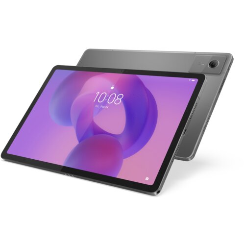 Na zdjęciu widoczny jest szary tablet z dużym ekranem, na którym wyświetlana jest godzina 10:08 oraz data "Fri, Feb 24" na tle abstrakcyjnej, fioletowo-różowej grafiki. W tle znajduje się tył urządzenia z widocznym aparatem.