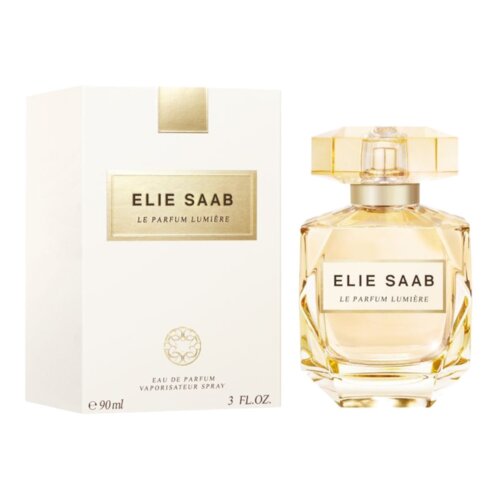 Na zdjęciu widoczna jest butelka perfum oraz pudełko z napisem "ELIE SAAB LE PARFUM LUMIÈRE". Na pudełku znajduje się także tekst "EAU DE PARFUM VAPORISATEUR SPRAY" oraz oznaczenie pojemności "e 90 ml 3 FL.OZ.".