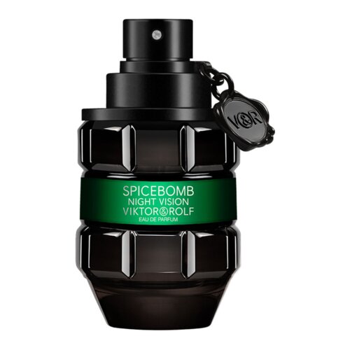 Czarny flakon perfum o kształcie przypominającym granat z zielonym paskiem, na którym widnieje napis: "SPICEBOMB NIGHT VISION VIKTOR&ROLF EAU DE PARFUM". Przy szyjce flakonu znajduje się czarny brelok z wytłoczonym logo "V&R".