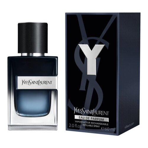 Na zdjęciu widoczna jest butelka perfum oraz pudełko z napisem "Yves Saint Laurent Y Eau de Parfum". Na pudełku znajduje się dodatkowy tekst: "Vaporisateur Rechargeable Refillable Spray 2.0 fl. oz. e 60 ml".