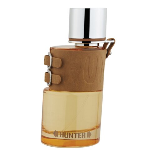 Butelka perfum o pojemności 100 ml z przezroczystego szkła, z brązowym skórzanym elementem ozdobnym i srebrnym korkiem; na dole widoczny napis "HUNTER".