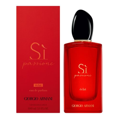 Czerwone opakowanie i flakon perfum z czarnym korkiem, na opakowaniu widnieje napis: "Sì passione éclat eau de parfum GIORGIO ARMANI VAPORISATEUR SPRAY 100 ml 3.4 FL.OZ.". Na flakonie znajduje się napis: "Sì passione éclat".