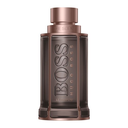 Butelka perfum o eleganckim, ciemnym szkle z metalicznymi elementami, na której widnieje napis "BOSS" oraz "LE PARFUM". Na górze butelki znajduje się napis "THE SCENT".