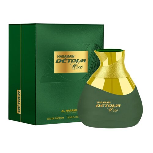 Zielone opakowanie i flakon perfum "Haramain Detour Eco" z widocznymi złotymi elementami. Na opakowaniu i flakonie znajduje się tekst: "Haramain Detour Eco", a poniżej "Al Haramain Since 1970 Eau de Parfum 3.33 fl.oz.".