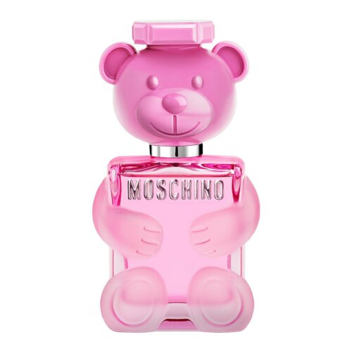 Różowa butelka perfum w kształcie misia z napisem "MOSCHINO" na przodzie. Kształt misia jest szczegółowo odwzorowany, z widocznymi uszami, oczami i nosem.