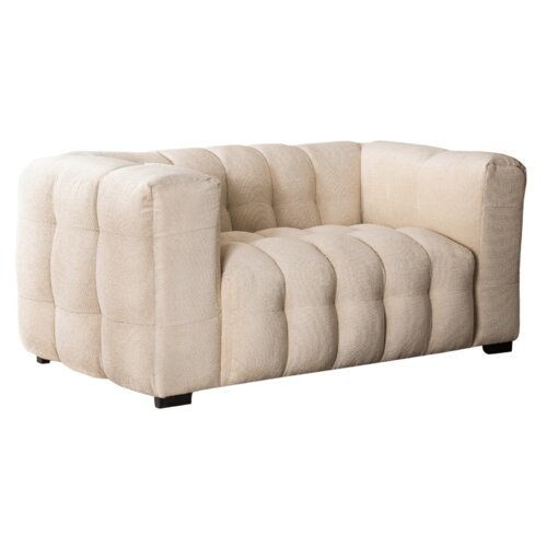 Kremowa, trzyosobowa kanapa o pikowanej powierzchni i prostokątnym kształcie, z niskimi, czarnymi nóżkami. Produkt nosi nazwę "Kanapa Sofa Glamour 3 Osobowa Do Salonu Wygodna Kremowa MODERNO 2S".