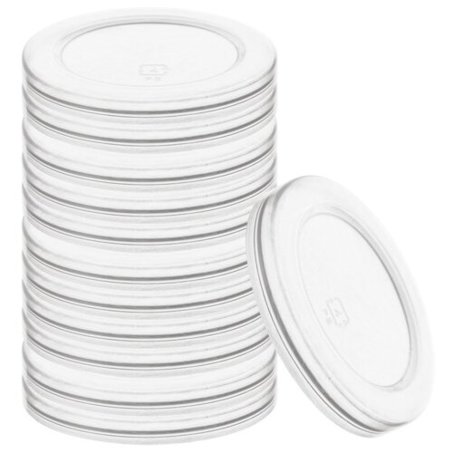 Stos przezroczystych pokrywek do słoików, ułożonych jedna na drugiej, z jedną pokrywką opartą o stos. Na pokrywkach widoczny jest symbol "4 PE".