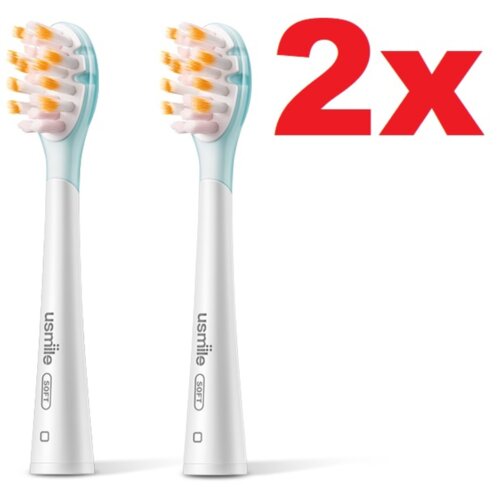 Dwie końcówki szczoteczki z napisem 'usmile SOFT' oraz duży czerwony napis '2x'.